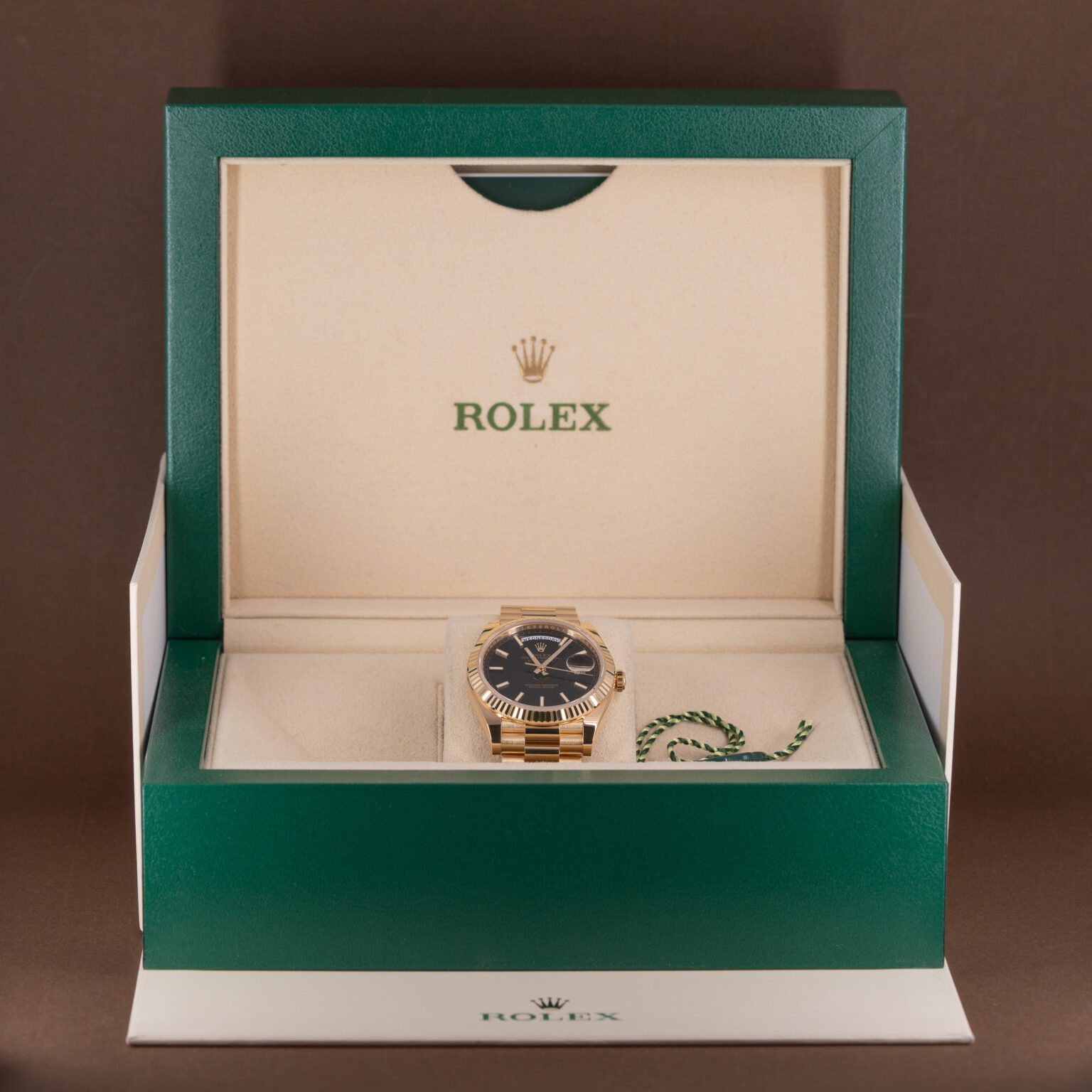 18k gold Rolex Day-Date 40 ref. 228238 from 2023.