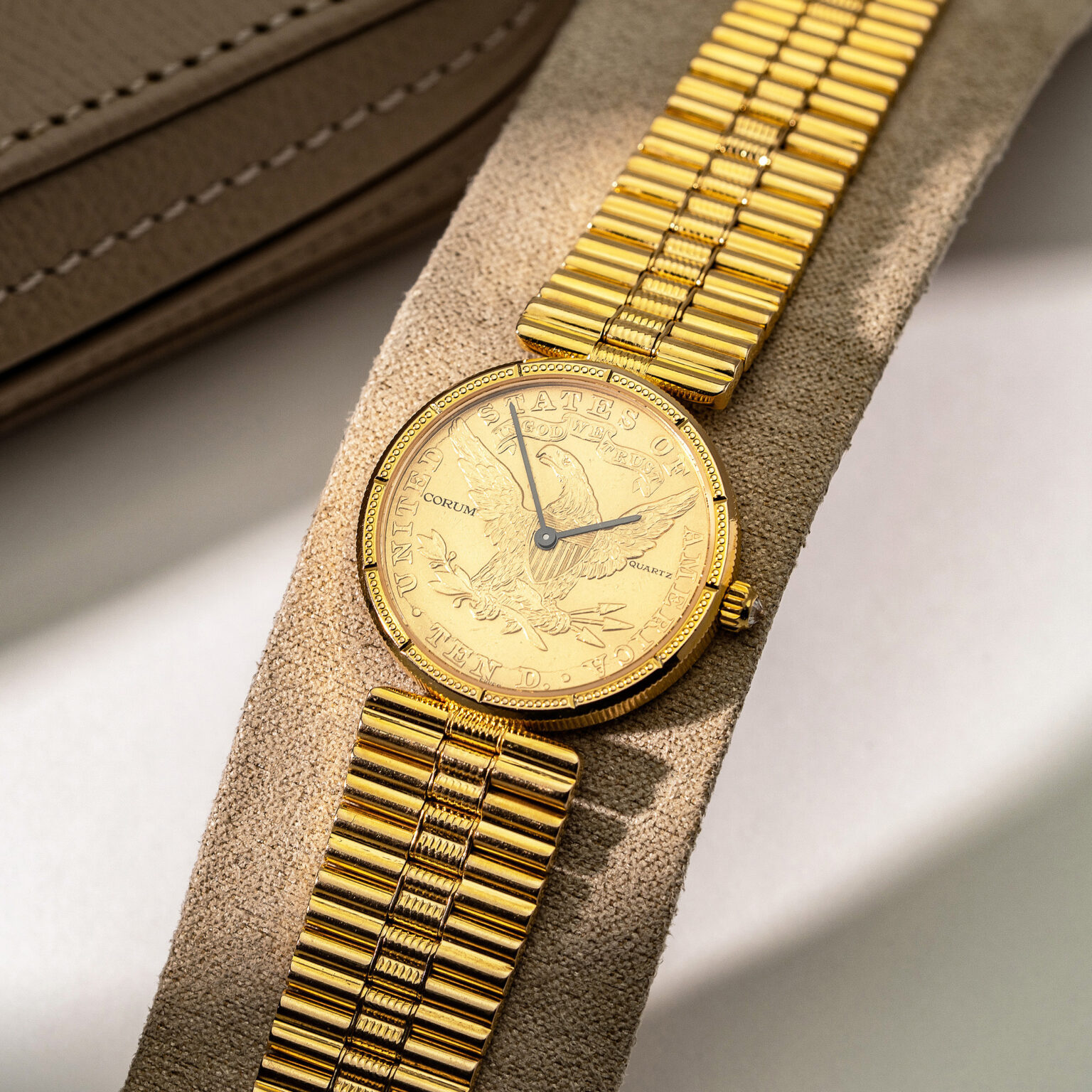 18k Corum Eagle Liberty-head coin watch.