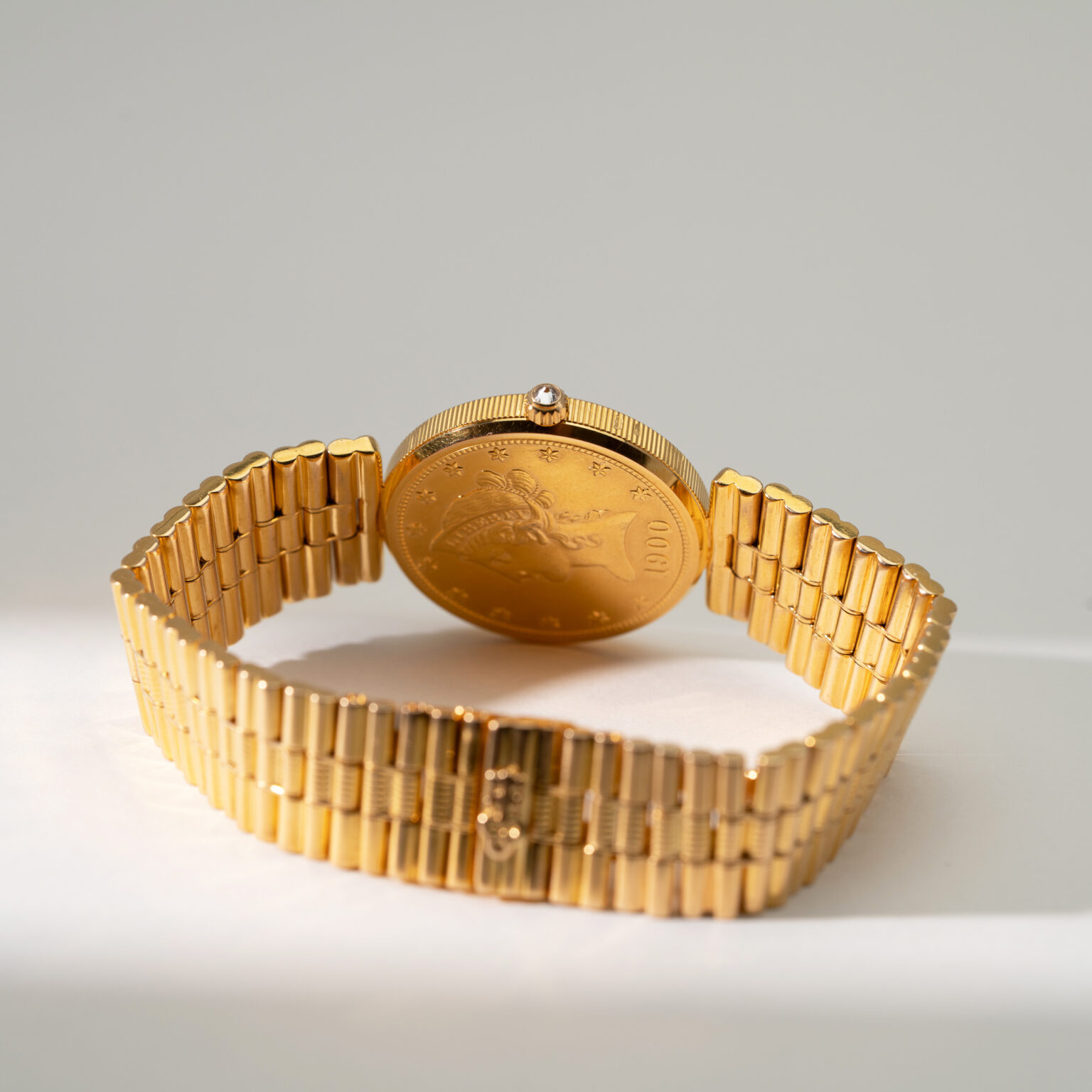 18k Corum Eagle Liberty-head coin watch.