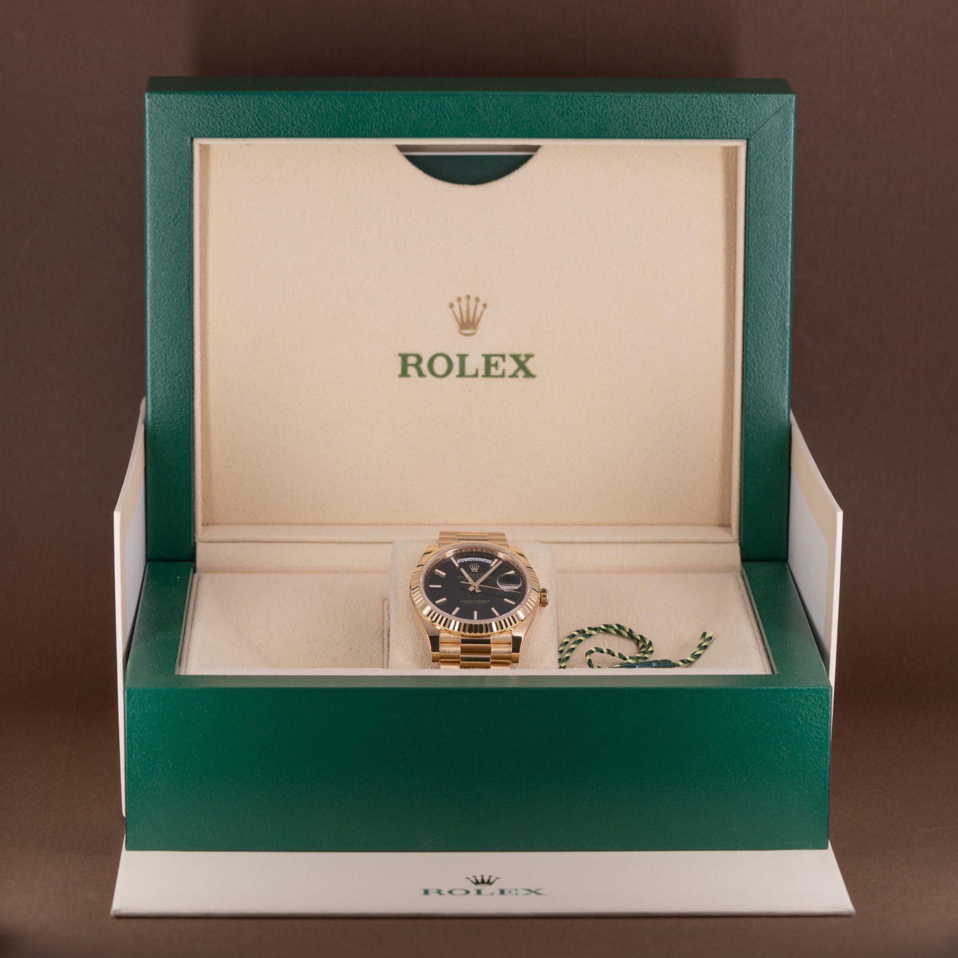 18k gold Rolex Day-Date 40 ref. 228238 from 2023.
